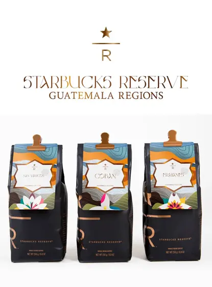 Three black and copper Starbucks Reserve bags with illustrated mountains and flowers for San Marcos, Cobán and Fraijanes